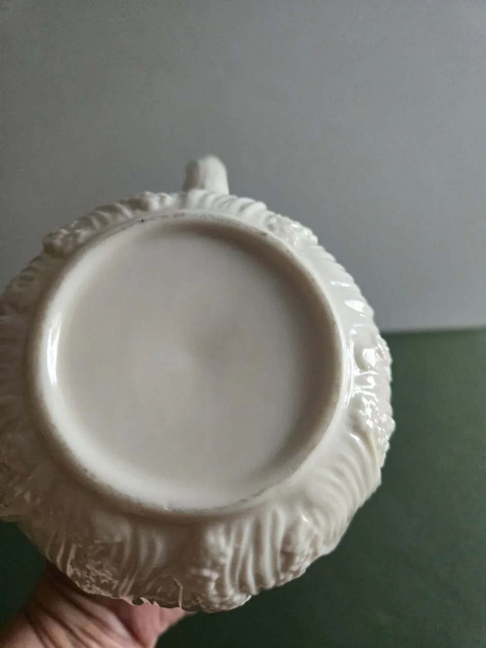 Pair of Ivory Bisque Pitchers